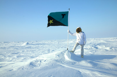 Who Deserves Aquamarine, Black, and Gold, (FLAG), 2005-06 Flag: cotton, linen. Lightbox, print. 27 x 3 by Tavares Strachan