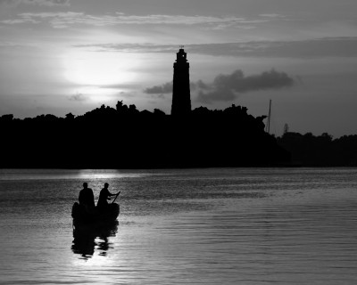 Hopetown Lighthouse at Sunset (1962) by Roland Rose